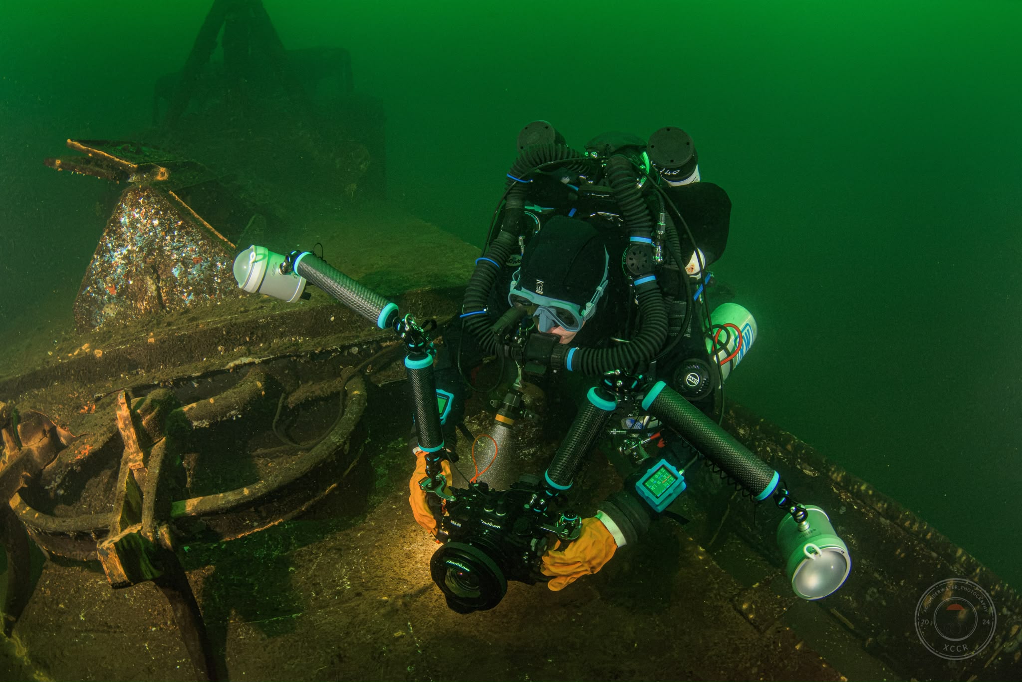 Richard diving on a wreck with his camera rig and strobes